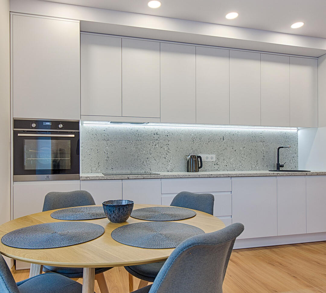 Affordable Kitchen Renovation Packages in Sydney Starting from $20,000 Contemporary kitchen renovation with premium cabinetry and lighting, representing affordable kitchen renovation packages and custom kitchen remodeling services in Sydney.